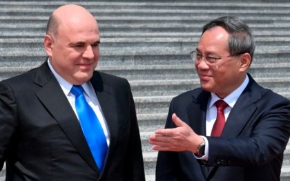 On Beijing visit, Russian prime minister says pressure from West is strengthening ties with China