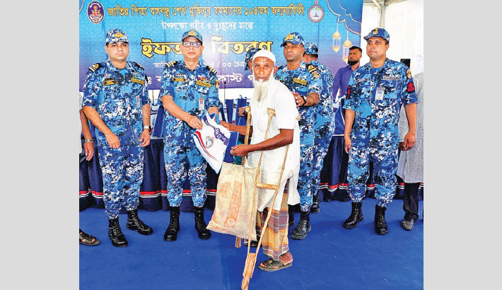 Bangladesh Coast Guard distributes iftar among underprivileged people across various districts marking the 104th birth anniversary of Father of the Nation Bangabandhu Sheikh Mujibur Rahman on Sunday.