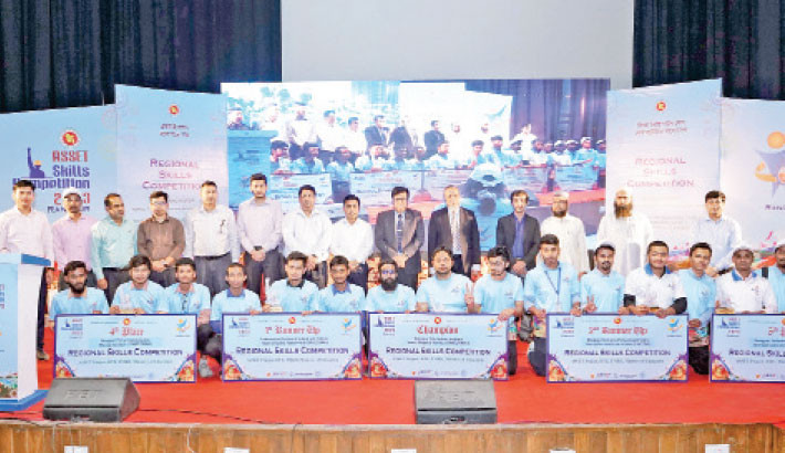 Winners along with guests pose for a photograph at a prize distribution ceremony of a competition titled Skills and Innovation Competition 2023 organised by ASSET at Dinajpur District Art Academy on Saturday.