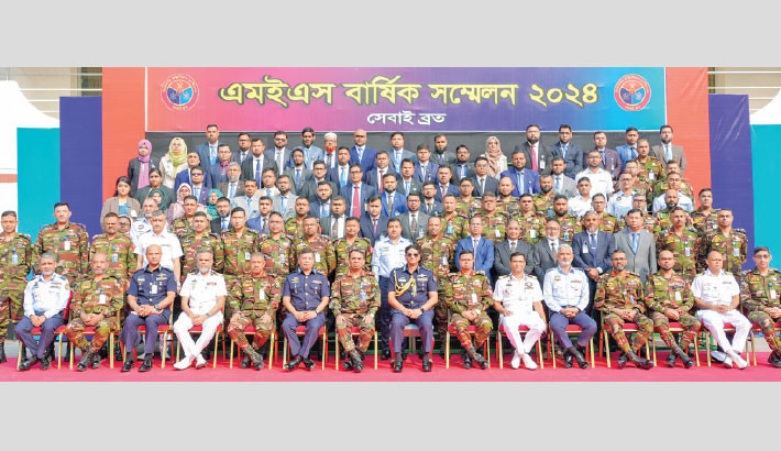 Air Chief Marshal Hasan Mahmood Khan takes part in a photo session on the second day of the Military Engineers Services (MES) Annual Conference 2024 at the MES Convention Hall in Dhaka Cantonment on Monday. -Photo ISPR
