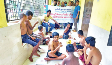 President of Bogura Rotary Club and Bogura Chamber of Commerce and Industries Md Sairul Islam inaugurates a moth-long food distribution programme among disabled children at the training and rehabilitation centre of the socially disabled girls in Barpur of Bogura Sadar upazila on Wednesday.    -  Daily Sun Photo