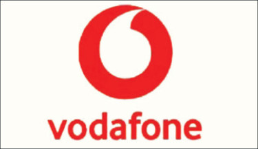 Vodafone swings into loss, expects rebound in Germany
