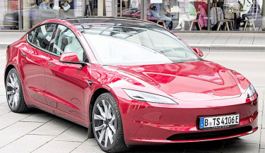 Tesla reports lower car sales, extending slump