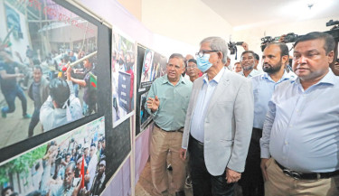 BNP Secretary General Mirza Fakhrul Islam Alamgir visits a photography exhibition on the July Revolution following a discussion titled "The Role of Journalists in Mass Uprisings of Students and Citizens" at the Jatiya Press Club on Thursday. -Daily Sun Photo