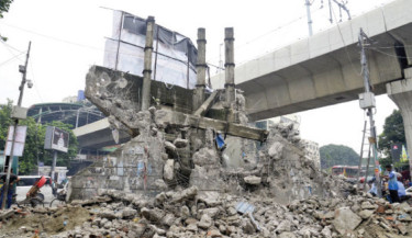 Projonmo Chattar at Shahbagh intersection being demolished