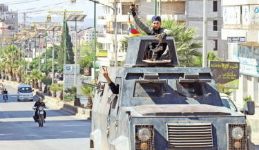 Syria troops quit Druze heartland leaving bodies on streets