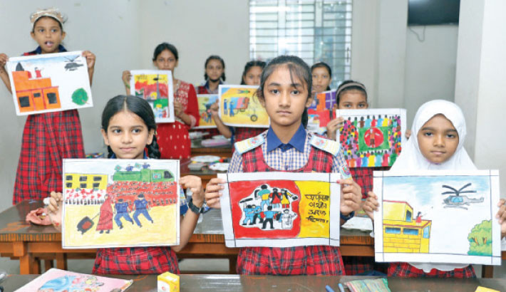 Students of Afajuddin Memorial School and College show their art works at a painting competition organised by Gazipur Digital University, commemorating the martyrs of the July mass uprising on Saturday.