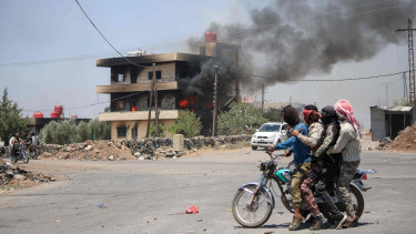 Clashes, homes torched in south Syria's Sweida despite ceasefire