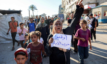 Gaza civil defence says Israeli fire kills 39 near two aid centres