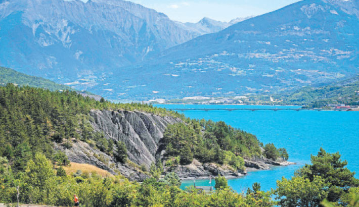 This photograph shows the lake of Serre-Poncon near Prunieres, southeastern France on 21 July 21 2025. Photo: AFP