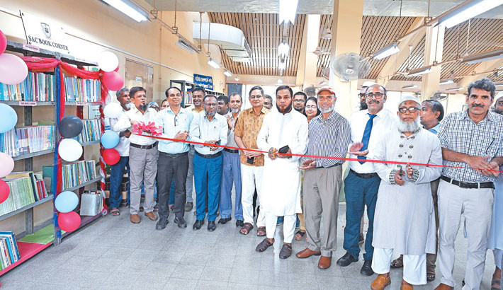Gazipur Agricultural University (GAU) Vice-Chancellor Professor Dr GKM Mustafizur Rahman and SAARC Agriculture Centre Director Dr Md Harunur Rashid cut the ribbon at the inauguration programme of SAARC Agriculture Centre (SAC) Book Corner at the GAU central library on Tuesday. – Daily Sun Photo