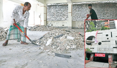 Workers clean the vandalised Awami League office in the capital’s Gulistan, which is set to be transformed into the International Fascism and Genocide Research Institute. The photo was taken on Thursday. -Daily Sun Photo
