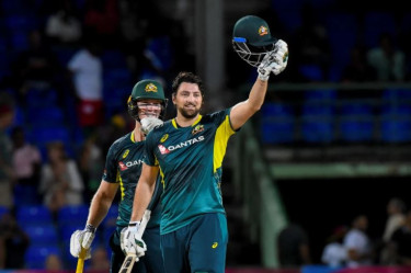 David's century sparks Aussies to T20I clincher over WIndies