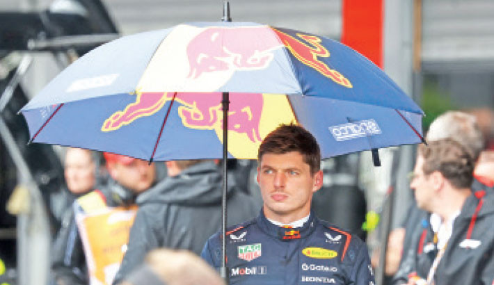 Red Bull Racing's Dutch driver Max Verstappen looks on after a red flag delayed the start of the Formula One Belgian Grand Prix by almost 90 minutes at the Spa-Francorchamps circuit in Spa on Sunday. -AFP Photo