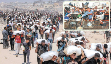 People walk with sacks of flour delivered after trucks carrying humanitarian aid entered northern Gaza on Sunday, coming from the Zikim border crossing. Inset, Palestinians crowd at a lentil soup distribution point in Gaza City in the northern Gaza Strip.










AFP PHOTO