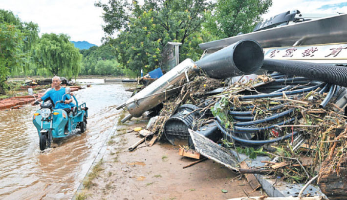 Heavy rain, landslides kill over 30 in northern China
