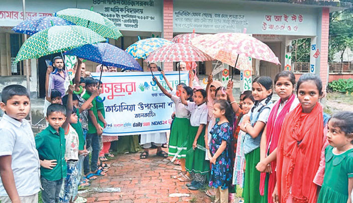 Underprivileged schoolchildren receive umbrellas in Jhalakathi