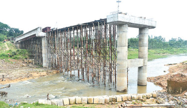 Thousands suffer as bridge construction stalls in Joypurhat