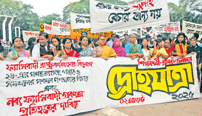 Students, workers and members of the public take part in a “Drohayatra” (March of Defiance) at the Central Shaheed Minar on Saturday, demanding the elimination of fascist state structures, justice for the 2024 genocide and
land-hill killings, and resistance against rising authoritarianism.   -  DAILY SUN PHOTO