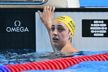 Australia's beaming Harris foils Walsh treble bid at swimming worlds