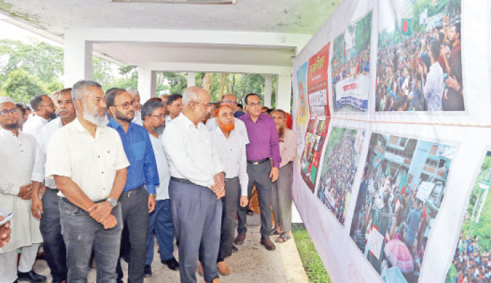 Bangladesh Agricultural Research Institute holds a photo exhibition titled “July Revolution Photo Exhibition-2024” at main gate of the administrative building on Sunday to commemorate the July uprising, for the revival of democracy and pay tribute to the martyrs. –Daily Sun Photo