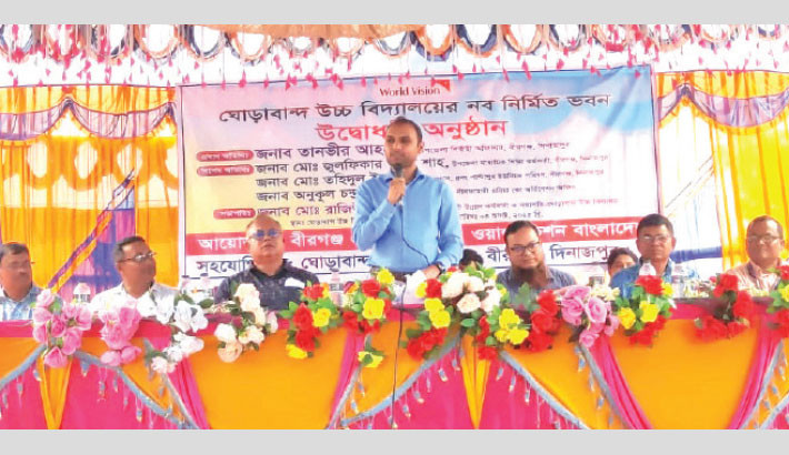 Birganj Upazila Nirbahi Officer Md Razibur Rahman and others attend a programme where the World Vision Bangladesh gifts a newly constructed fully furnished building to Ghoraband High School in Birganj of Dinajpur at a cost of Tk78.36 lakh. –Daily Sun Photo