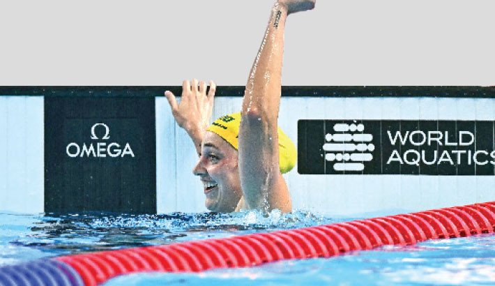 Meg Harris wins 50m freestyle gold