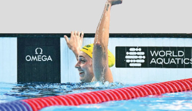 Meg Harris wins 50m freestyle gold
