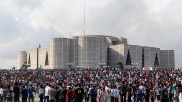 Interim govt to unveil democratic overhauls on revolution anniversary