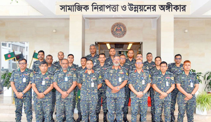 Fifteen newly promoted officers of Bangladesh Ansar and Village Defence Party pose with Director General Maj Gen Abdul Motaleb Sazzad Mahmud during a rank badge ceremony at the force’s headquarters on Wednesday. -ANSAR PHOTO