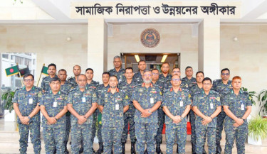 Fifteen newly promoted officers of Bangladesh Ansar and Village Defence Party pose with Director General Maj Gen Abdul Motaleb Sazzad Mahmud during a rank badge ceremony at the force’s headquarters on Wednesday. -ANSAR PHOTO