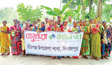 Dinajpur ethnic minority families receive vegetable seeds, saplings