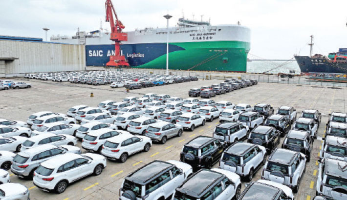 Chinese-made cars are seen on the dock before being loaded onto a ship at the port in Lianyungang, in China’s eastern Jiangsu province on 10 August 2025. Photo: AFP