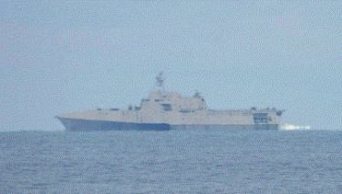 US briefly deploys 2 warships to a disputed South China Sea shoal after Chinese collision