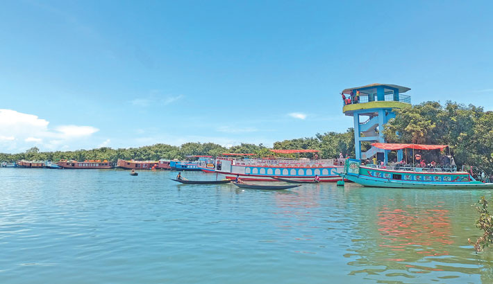 Unlike most tourist destinations, where the government typically collects revenue from houseboat operators, Sunamganj remains an exception. For the past decade, more than 600 modern, state-of-the-art houseboats have been operating at various tourist attractions in the district without paying any tax to the government. The photo 
was taken at Tanguar Haor on Wednesday. —   JAHANGIR ALAM