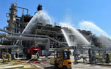 Ukraine targets Russian oil refinery, apartment block