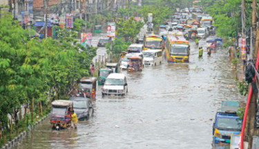 Heavy rain at dawn on Sunday leads to waterlogging in the Kalshi area of Mirpur, disrupting traffic and causing hardships for commuters. -Daily sun Photo
