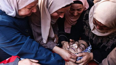 Israel pounds Gaza City, kills at least 57 across Strip