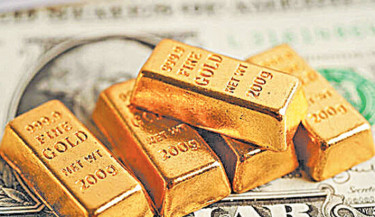 Gold edges down on stronger dollar, Powell’s remarks in focus