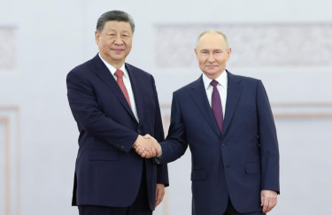 Xi says China, Russia ties 'most stable' in turbulent world