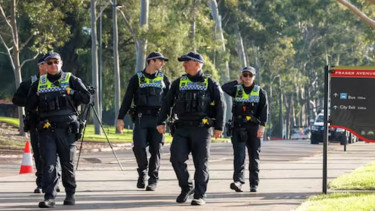 'Horrific' shooting kills two police in Australia