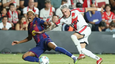 Barca hold on for draw against impressive Rayo
