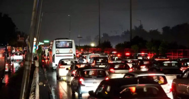 Eight-hour traffic jams in Delhi suburb as rains wreak havoc