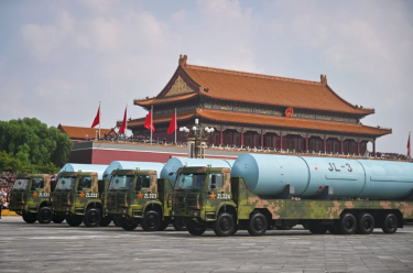 China unveils new weapons in massive parade
