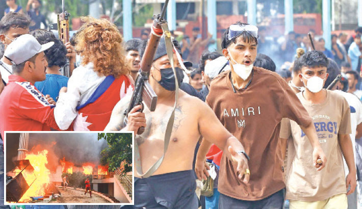 Protesters carry firearms as they gather outside the Singha Durbar palace complex during a protest to condemn the police's deadly crackdown on demonstrators in Kathmandu on Tuesday, a day after demonstrations over social media prohibitions and corruption by the government. Inset, demonstrators run past flames outside the burning Nepali Congress Party office during the protest. Nepal rolled back its social media ban on Tuesday, a day after at least 19 people were killed in youth protests.-AFP PHOTO