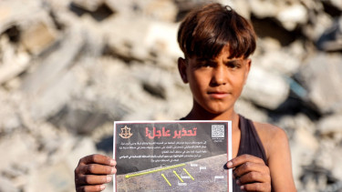 'World watches our slaughter': Gazans flee Israeli assault on urban hub