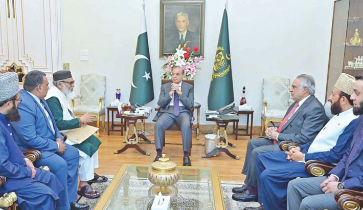 Religious Affairs Adviser Dr AFM Khalid Hossain pays a courtesy call on Prime Minister of Pakistan Shehbaz Sharif on Thursday. -PID PHOTO