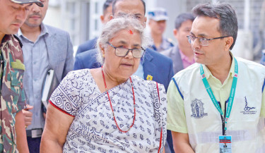 Nepal returns to calm as first woman PM takes charge