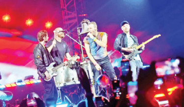 Coldplay get giddy as they smash Wembley Stadium record