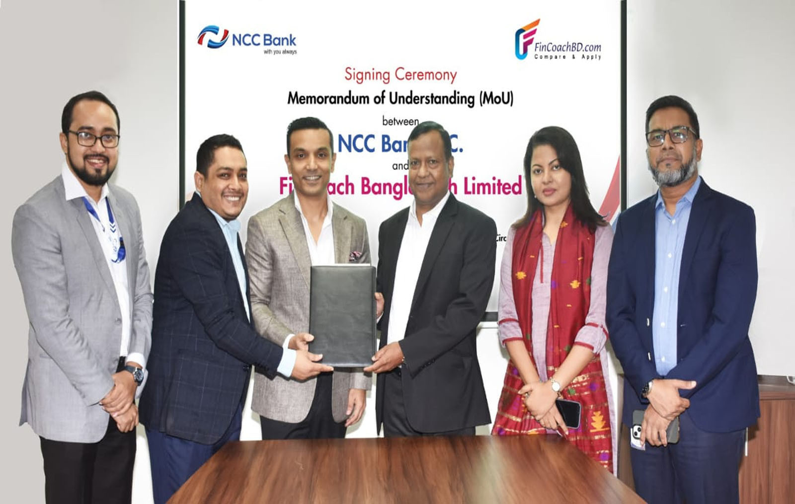 NCC Bank signs agreement with FinCoach Bangladesh for business development